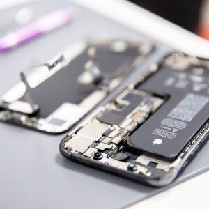 RUSSIA - July 27, 2020: Repair iPhone apple broken phone screen and replace used rechargeable batteries for recycling.